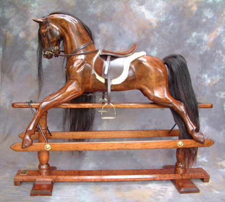 cherry rocking horse on safety stand